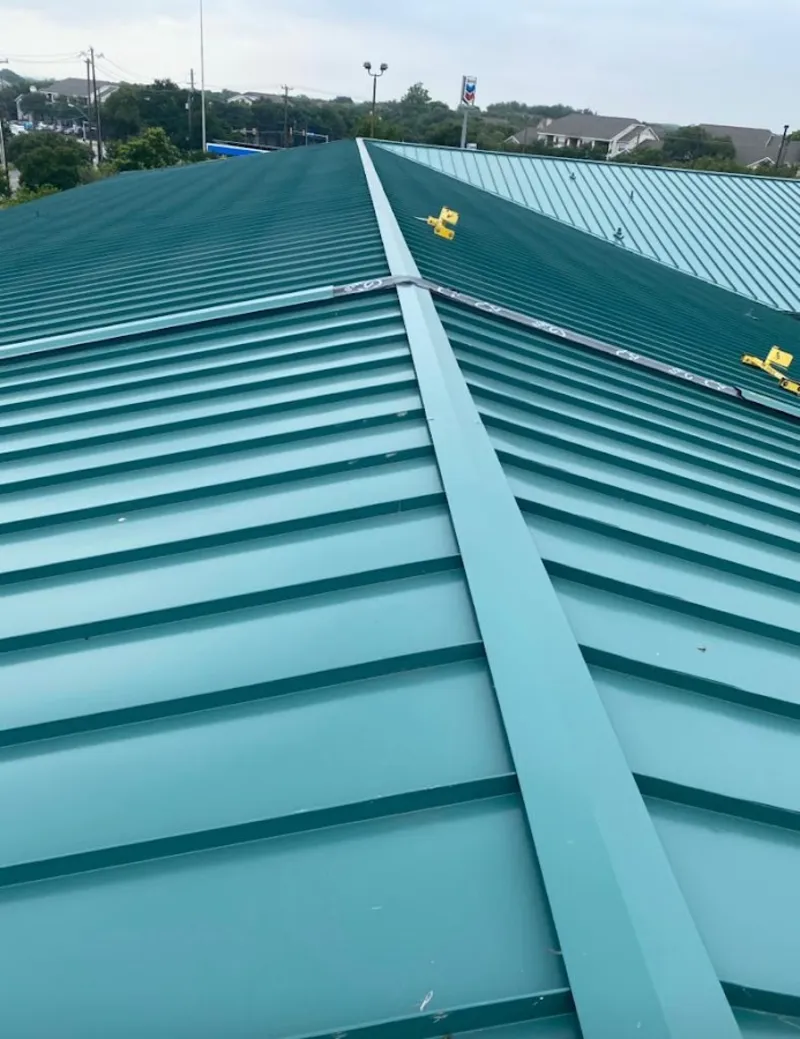 Green commercial metal roof ridge and valley for Metal Roof Repair in Ilchester